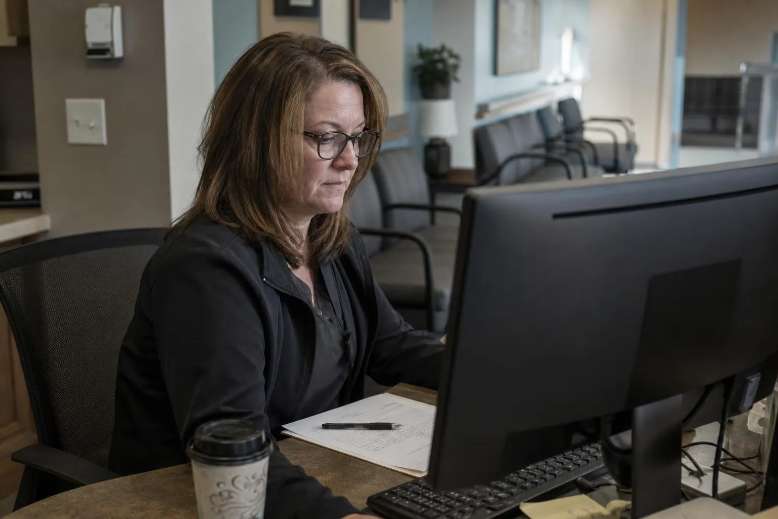 A practice administrator starts the morning with a structured list of overnight call summaries at the front desk