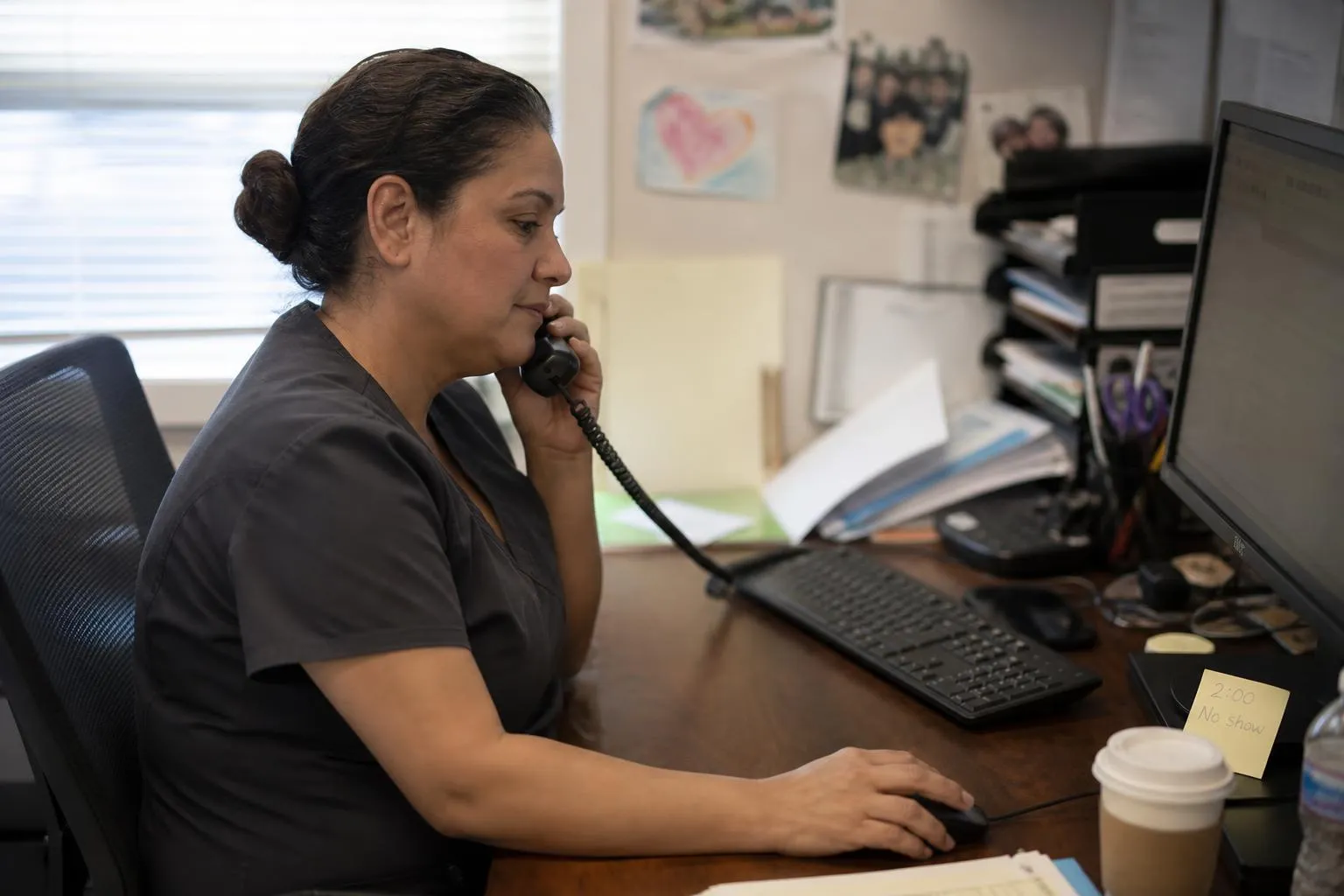 A practice administrator reviewing open appointment slots on a clinic scheduling screen
